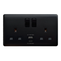 Matte Black electrical wall socket with usb ports on a white background